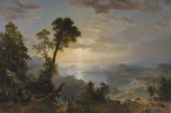 An expansive 19th-century landscape painting, likely of the Hudson River Valley, showing a vast river or bay surrounded by rolling hills and mountains under a dramatic sky. The foreground is marked by tall, gnarled trees, while the middle ground features a cluster of buildings along the shore, suggesting the gradual encroachment of civilization into the wilderness.