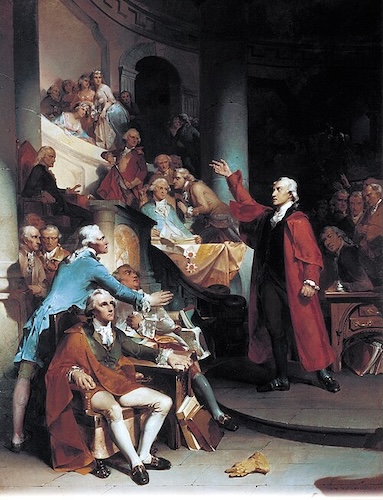 A painting depicts the dramatic scene of Patrick Henry speaking passionately to a group of men in a formal hall. He is shown with an outstretched arm, standing before men seated at a table, while an audience watches from a balcony in the background.