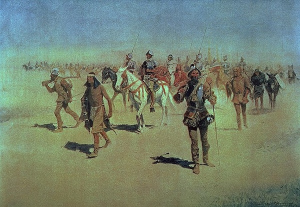 A wide-angle painting depicts a group of Spanish conquistadors on horseback and on foot, accompanied by Indigenous figures, traversing a vast, dusty landscape under a pale sky. In the foreground, a prominent conquistador in armor with a beard and an Indigenous man in traditional attire walk side-by-side, while other figures and horses recede into the distance.